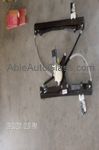 A window regulator is a device that carries the window up 
and down when in operation. Most vehicles today window regulators are made with a metal frame, plastic pulleys, plastic retainers where the glass attaches to, and a motor.